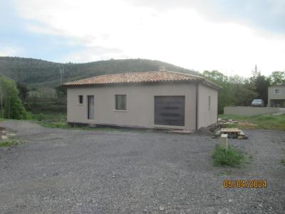 Menuiseries grises anthracite, enduit finition Gratté fin