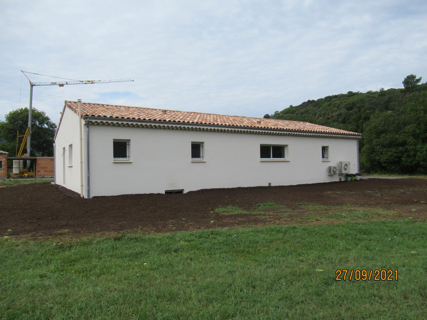 Menuiseries blanches, enduit finition Gratté fin