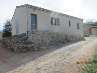 Menuiseries grises anthracite, enduit finition Gratté fin