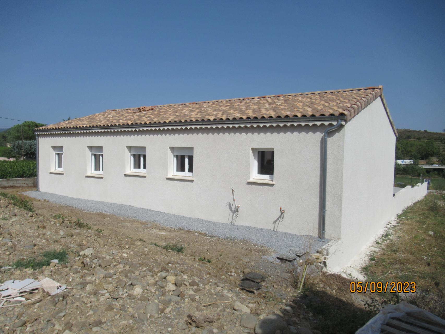 Menuiseries blanches, enduit finition Ecrasé